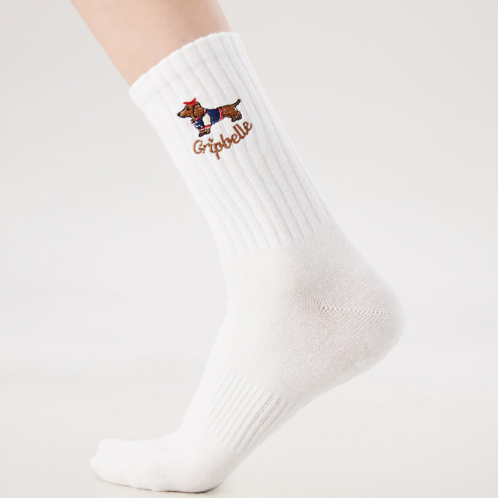 White Pilates grip socks with puppy embroidery and heart-shaped non-slip grips