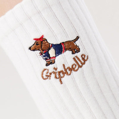Close up of the dachshund embroidery on Gripbelle Sunday Best Puppy pilates grip socks