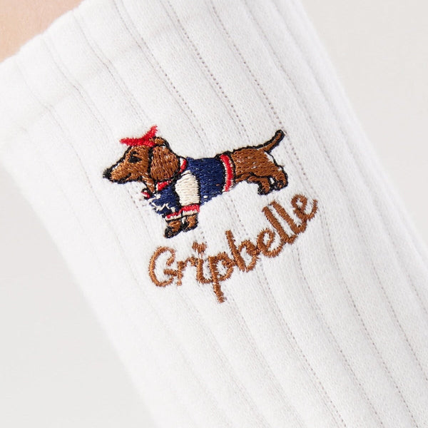 Close up of the dachshund embroidery on Gripbelle Sunday Best Puppy pilates grip socks